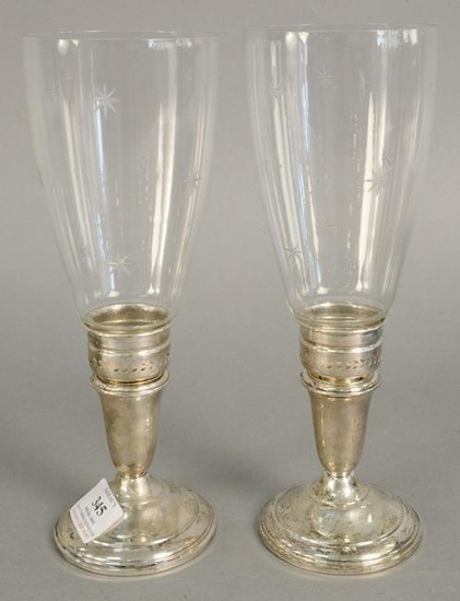 Pair of Cartier sterling silver candlesticks with