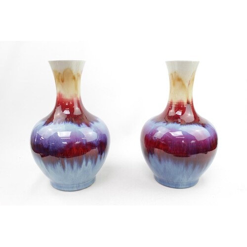 Pair of Chinese Sang-de-boeuf vases with character stamped m...