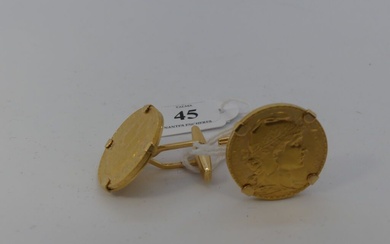 Paire de boutons de manchette en or sertie d'une pièce de 20 francs or République...