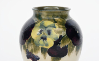'Pansy' a Moorcroft Pottery vase designed by William Moorcroft