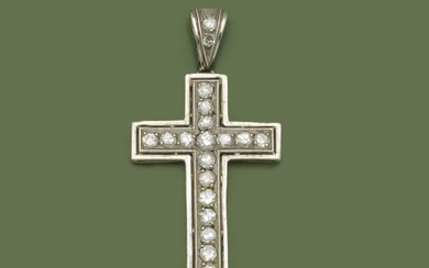 Pendentif croix en platine (850/1000) orné de diamants taille brillant en serti grain et clos...