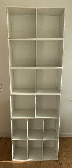 Peter J. Lassen: ''Montana''. Wall unit of white lacquered MDF, comprising of one large bookcase and four small bookcases. Manufactured by Montana. (5)