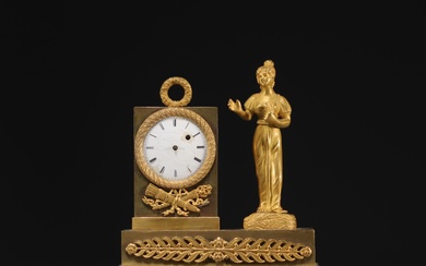 Petite pendule en bronze ciselé et doré d'époque Empire, mouvement Breguet, début XIXème. Une aiguille...