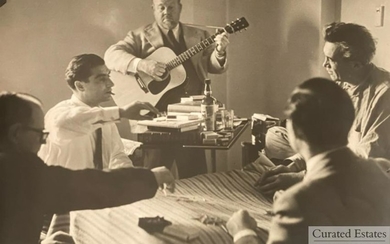 Photo of Robert Capa, Burl Ives, and John Huston