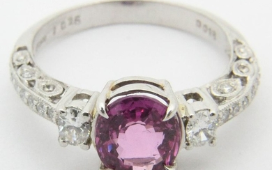 Pink sapphire, platinum, and diamond ring