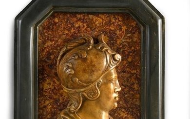 Profile of a helmet warrior in carved yellow marble from Siena, on a background of Spanish Brocatelle marble.