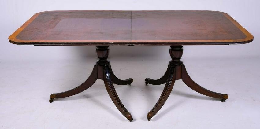 Regency style mahogany banded dining table