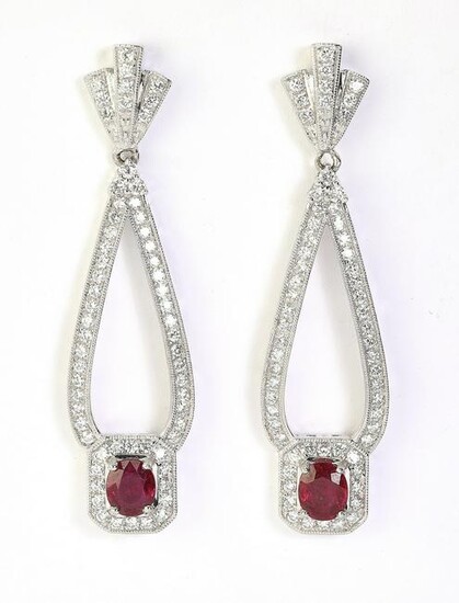 Ruby, diamond, and platinum ear pendants
