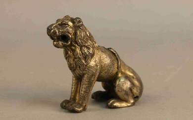 STATUTE of a seated lion in chased and gilt bronze. Italy or Germany, 16th century. Height : 10 cm
