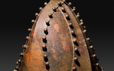 Sasanian Bronze Important and complete Helmet with balls decorations. 21 cm L. Good state. Published.