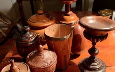 Set of eight turned wooden pieces: covered cups,...