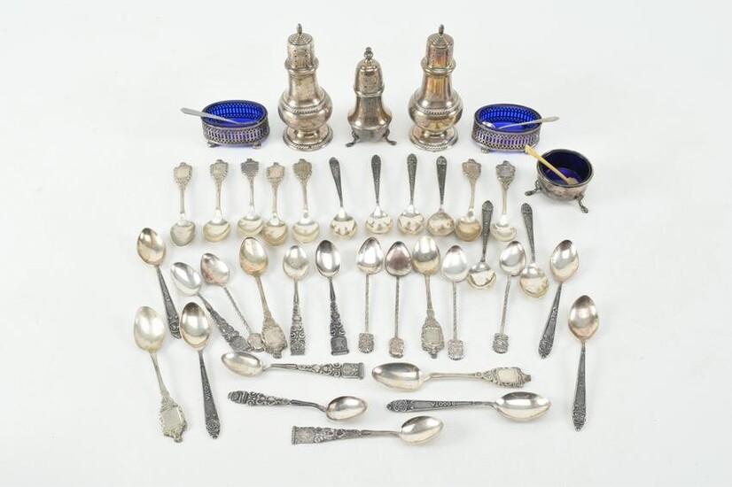 Silver spoons, salt and pepper shakers, and condiment