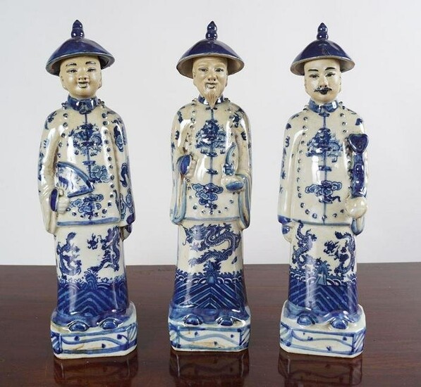 THREE CHINESE BLUE AND WHITE FIGURES
