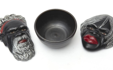 THREE PIECES OF AUCTRALIAN POTTERY INCLUDING TWO ALVA STONE ABORIGINAL WALL MASKS AND AN ERIC JUCKERT SIGNED BOWL