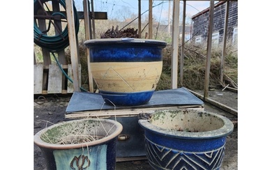 Three glazed exterior plant pots, blue detail largest is 22c...