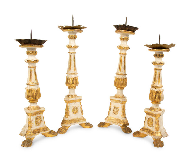 Two Pairs of Tuscan Painted and Parcel Gilt Candlesticks