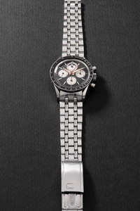 Universal, Ref. 881101/02 A fine and very rare stainless steel chronograph wristwatch with triple calendar, moon phases, bracelet, guarantee and presentation box