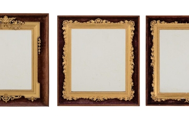 Y A pair of rosewood, velvet, giltwood and composition wall mirrors