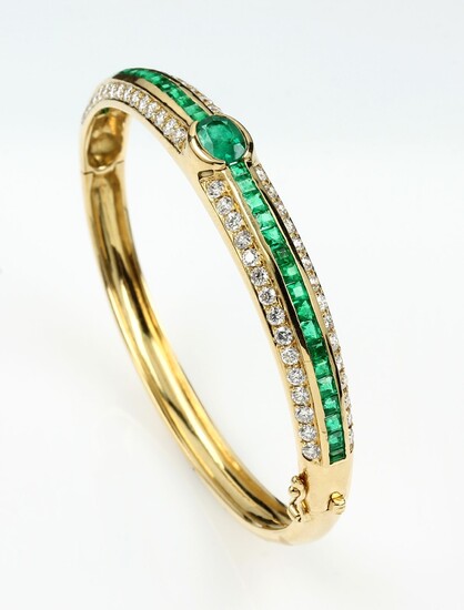18 kt gold bangle with emeralds and...