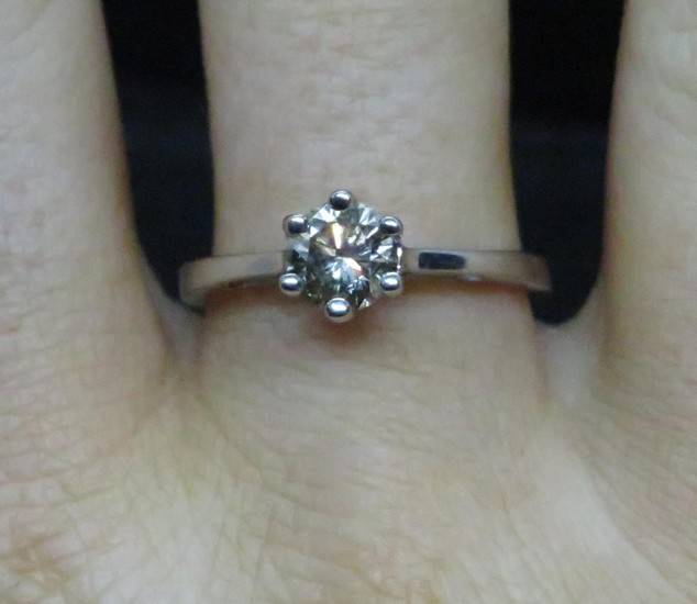 18ct white gold and diamond solitaire ring approx .6ct fully...