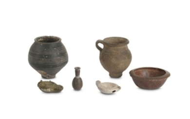 A GROUP OF ANCIENT POTTERY VESSELS Including a...
