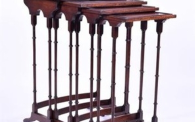 A quartetto nest of Edwardian mahogany tables comprising four graduated side tables,the tops with central veneered flame...