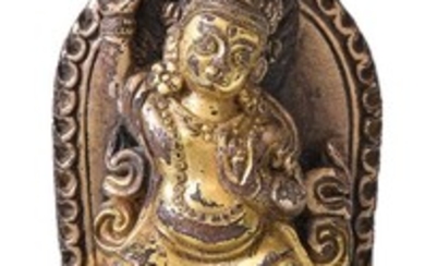 A small Tibetan gilt-bronze shrine