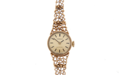 TISSOT - a lady's 9ct yellow gold Stylist bracelet watch. View more details