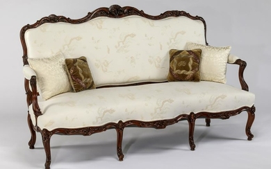 French Provincial style carved settee in damask