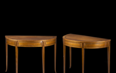 A pair of cherry wood and ebonised wood inlaid demilune consoles. Naples, early 19th century (cm 117x82,5x57,5) (restorations)