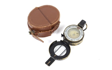 A 1943 MKIII brass cased military compass. TG Co Ltd, London. No B 220093