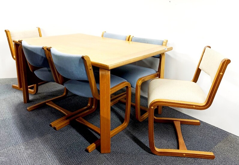 A 1970s Danish Club 8 extendable dining table, together with six cantilever dining chairs. 144cm extending to 196cm.