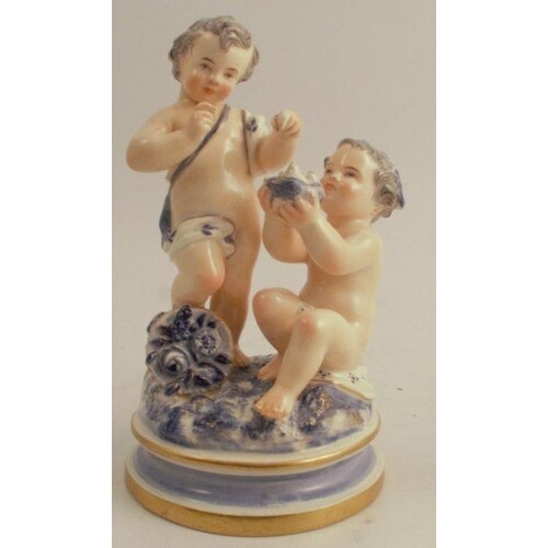 A 19th century Worcester figure group, of two children holdi...