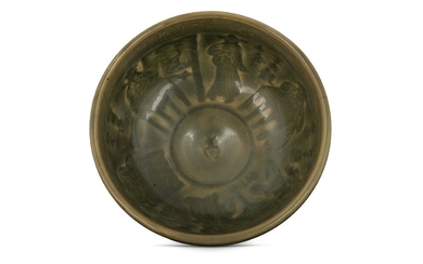 A CHINESE MOULDED CELADON FIGURATIVE BOWL.