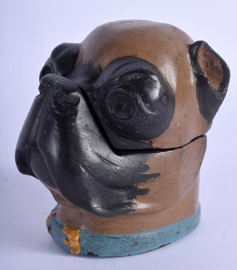 A COLD PAINTED PUG DOG INKWEL. 10 cm high.