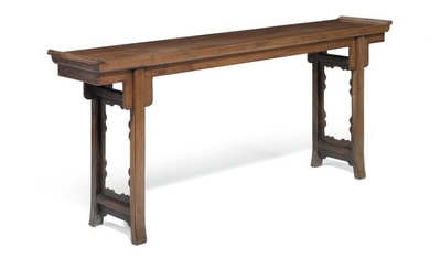 SOLD. A Chinese hardwood and elm alter table, openwork side-panels. Ming style, late 19th century. H. 87 cm. W. 39 cm. L. 207 cm. – Bruun Rasmussen Auctioneers of Fine Art