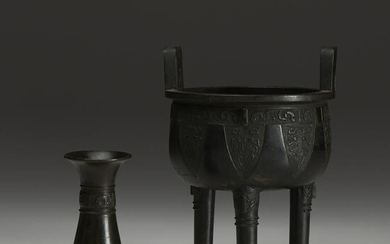 A Chinese patinated bronze tripod censer, Ding, with