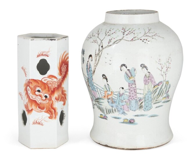 A Chinese porcelain hexagonal hat stand and baluster vase, Republic period, the hat stand painted in iron-red with two Buddhist lions, apocryphal six-character Tongzhi seal mark to base, the baluster vase decorated with ladies in a garden...