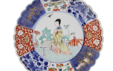 A Chinese verte-Imari plate with fluted rim, painted with a young woman...