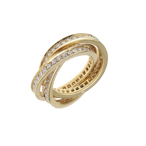A DIAMOND AND 18CT GOLD TRIPLE BAND RING. formed as three in...