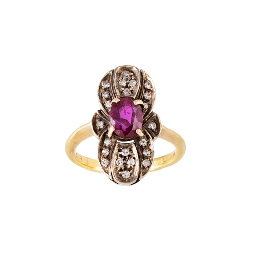 A DIAMOND AND RUBY PLAQUE RING, the oval ruby to a diamond s...