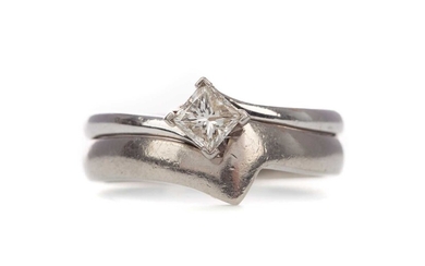 A DIAMOND SOLITAIRE RING AND SHAPE TO FIT WEDDING BAND