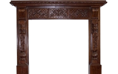 A DiLorenzo Carved Mahogany Mantle.