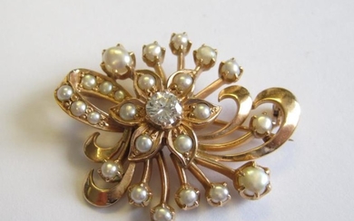 A Diamond and Cultured Pearl Flower Spray Brooch claw-set...