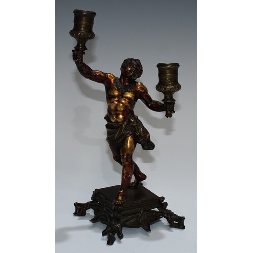 A European gilt and brown patinated bronze figural candelabr...
