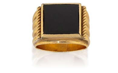 A French gold and onyx signet ring, the square-shaped black onyx bezel with ropework and fluted broad tapering shoulders, c.1945, French assay mark to hoop, ring size O½