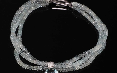 A French white gold aquamarine and diamond torsade necklace