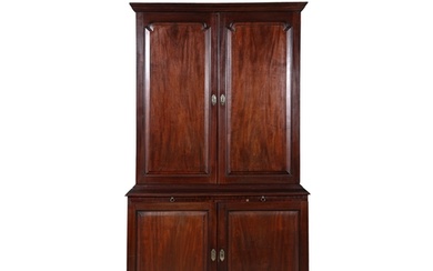 A GEORGE III MAHOGANY TWO-DOOR BOOKCASE, with moulded cave...