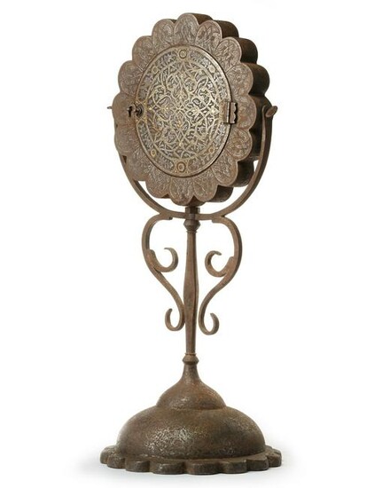 A GILT DECORATED METAL MIRROR HOLDER