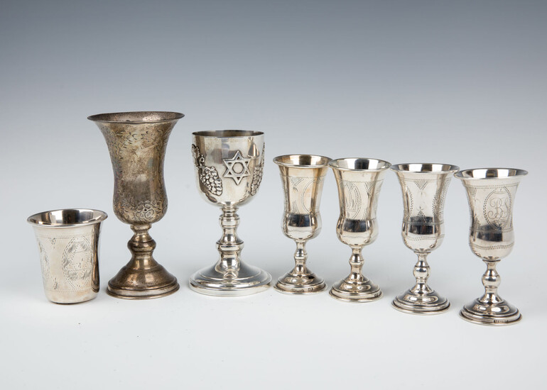 146. A GROUP OF SEVEN STERLING SILVER KIDDUSH CUPS.